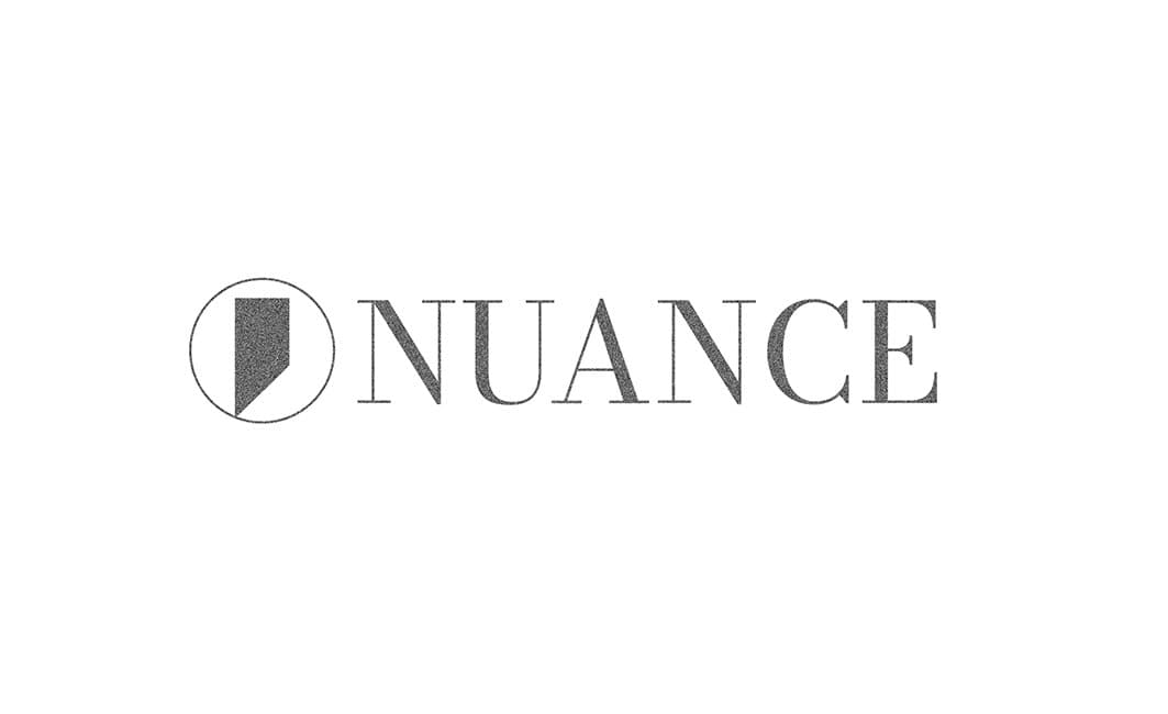 The name card: the mark and the NUANCE logotype in a light serif.